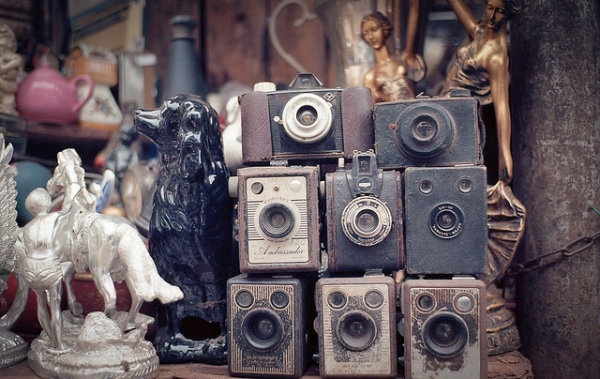 Vintage cameras are stacked with other knick-knacks in a shop in the Chor Bazaar in Mumbai, India on November 30, 2012. (Monkeypainter/Flickr)