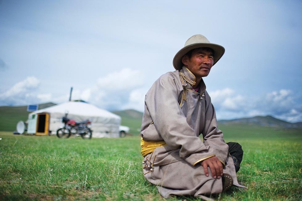 Myagmarchuluun, a herder in northern Mongolia, takes a break near his friend's ger (yurt). (Taylor Weidman)