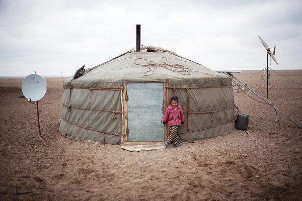 A ger (yurt) in the parched and dusty Gobi landscape near the Tavan Tolgoi coal mine. Many of the animals in the area have become sick due to the dust that has kicked up from constant truck traffic shipping coal from the mine to China. (Taylor Weidman)