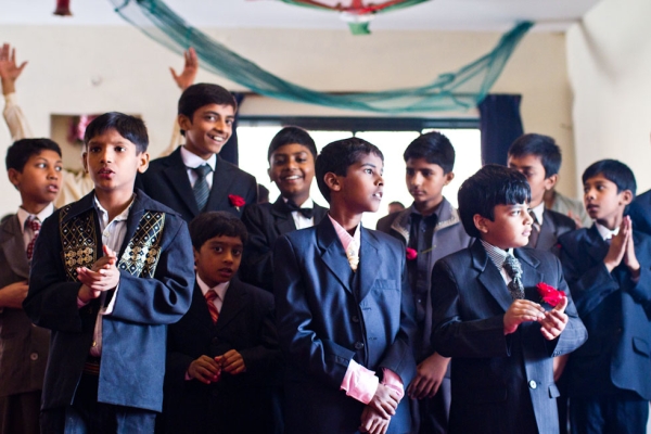 Girls in white dresses and boys in suits for the Christmas celebration at Dhala United Methodist Church, Lahore, Pakistan, in December 2011. (Nushmia Khan)
