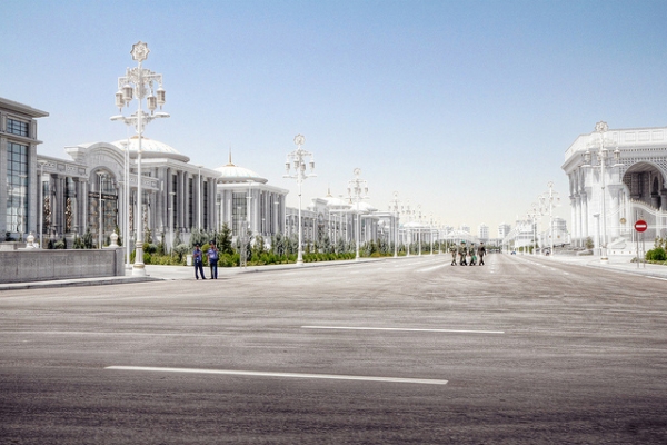Beautifully smooth tarmac and well-kept buildings line the deserted streets Ashgabat, Turkmenistan on January 16, 2013. (Neil Melville-Kenney/Flickr)