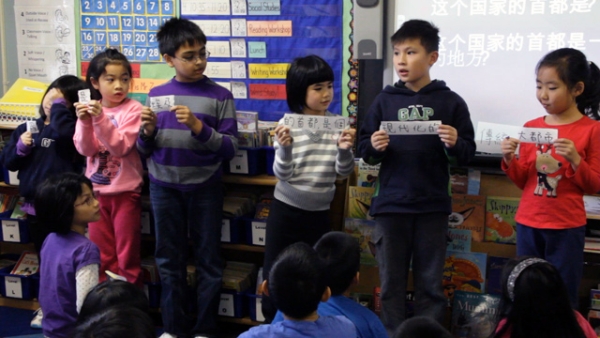 Third grade students line up for a sentence structure activity in Ms. Chang's class at the Fresh Meadow School in Queens, New York.