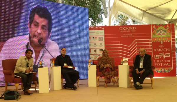 Mohammed Hanif (far left and onscreen), best known for his 2008 novel A Case of Exploding Mangoes, at the 2013 Karachi Literature Festival. (Annie Ali Khan)
