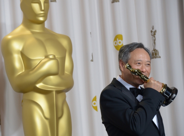 Ang Lee holds the trophy for Best Director for the movie Life of Pi in the press room during the 85th Annual Academy Awards on February 24, 2013 in Hollywood, California. (Joe Klamar/AFP/Getty Images)