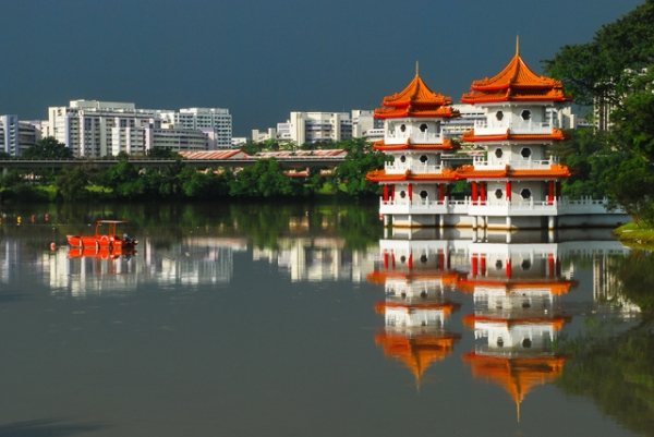 Bright, orange-topped pagodas are reflected in the calm waters of Chinese Garden in Jurong East, Singapore on March 9, 2013. (Eduardo S. Seastres)