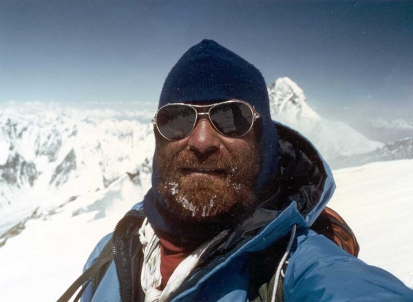 Nazir Sabir on Broad Peak, in northern Pakistan's Karakoram range, with K2 in the background. (Nazir Sabir)