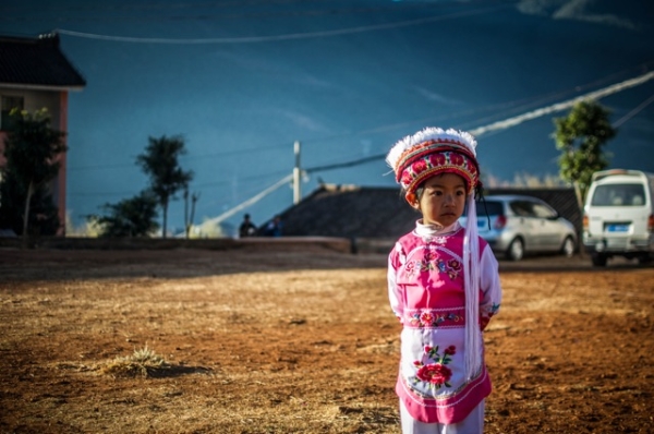 A young girl in Baizu costume in Jizushan, Yunnan Province, China on December 27, 2012. (James Moallem)