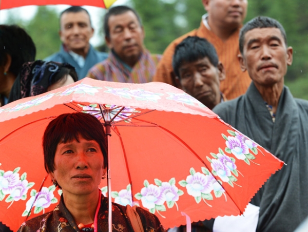A Bhutanese woman outside a polling station, waits to cast her vote in the second ever parliamentary election in Paro, Bhutan on May 31, 2013. (Roberto Schmidt/AFP/Getty Images)
