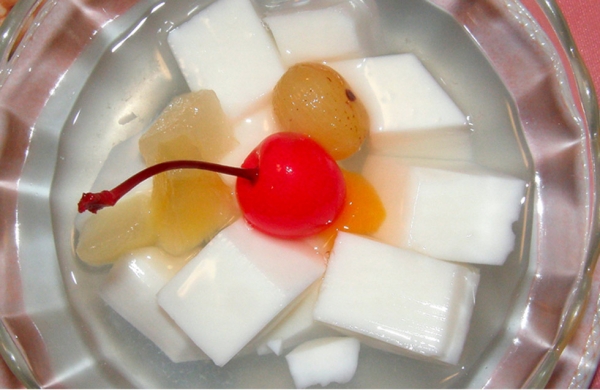Almond jelly, which uses blanched apricot kernels sometimes called "almonds." They are smaller than almonds and have a stronger flavor. (nemo's great uncle/Flickr)