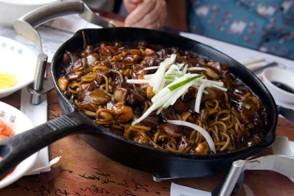 Jjajangmyeon, above, is a "Koreanized" black bean noodle dish directly borrowed from China's zhajiangmian. (Pabo76/Flickr)
