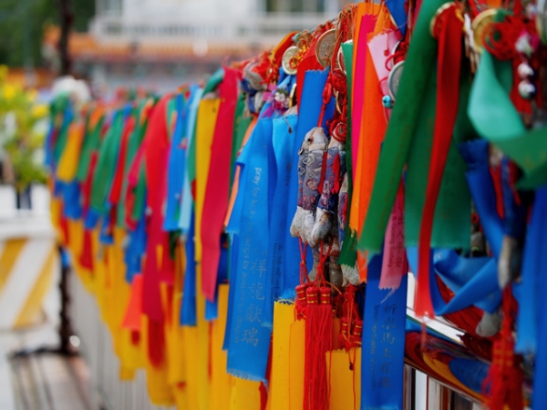 Colorful prayer ribbons and medals adorn the Kek Lok Si Temple in Penang, Malaysia on July 15, 2013. (ansel.ma/Flickr)