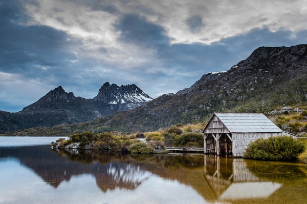 The Cradle Mountains tower over the tranquil waters of Dove Lake in Tasmania, Australia on September 10, 2013. (Luke Chapman/Flickr)