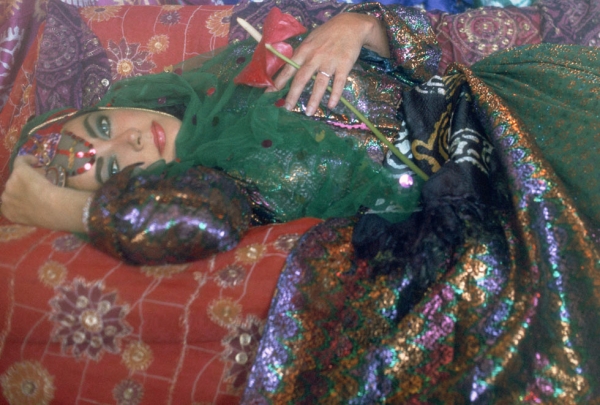 Elizabeth Taylor Dressed as an Odalisque I at the Tehran Hilton Hotel, Iran, 1976. Printed 2011. (Firooz Zahedi/Leila Heller Gallery, NY)