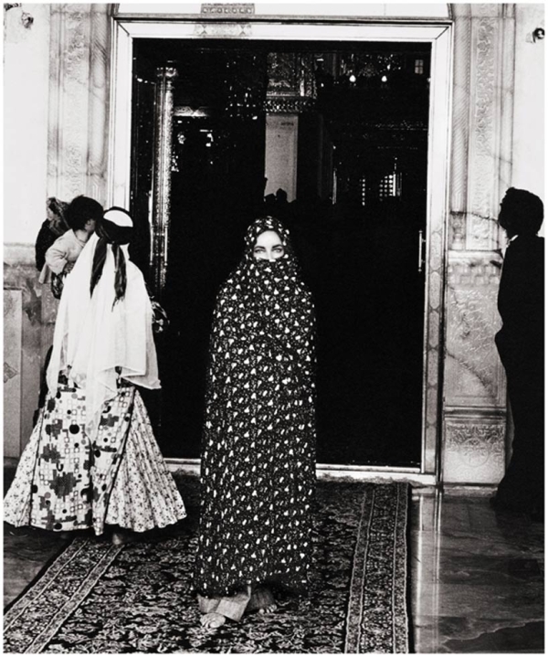 Elizabeth Taylor Wearing a Chador at the Shah Cheragh Shrine, Iran, 1976. Printed 2011. (Firooz Zahedi/Leila Heller Gallery, NY)