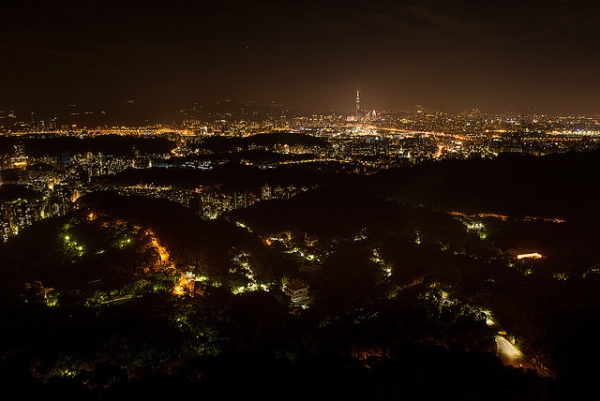 City lights shimmer below in Taipei, Taiwan on November 23, 2013. (liu jenny/Flickr) 