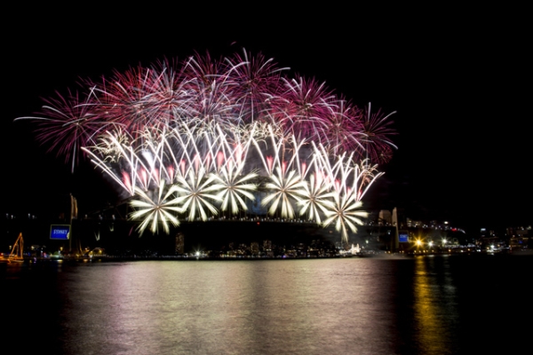 One of the first countries to ring in the new year, a fireworks showcase explodes in Sydney Harbor, Australia on January 1, 2014. (Halans/Flickr)