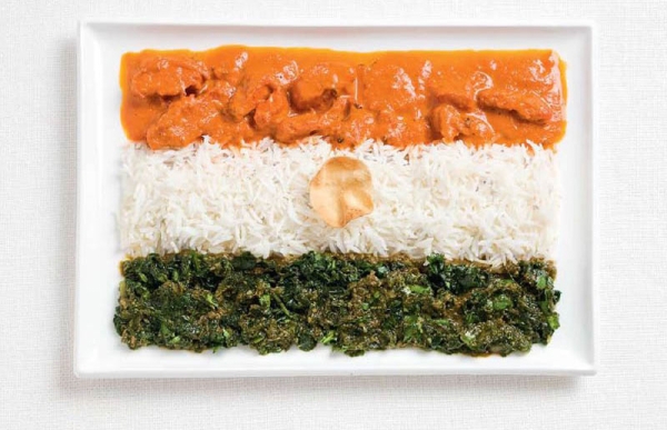 The Indian flag made from curries, rice, and pappadum wafer.