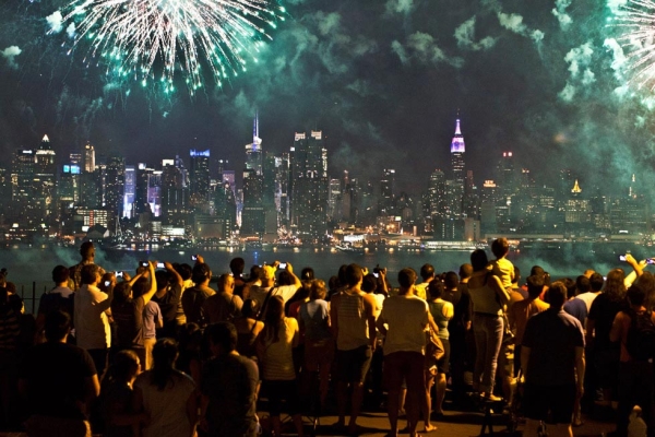 People watch fireworks on July 4, 2013 in Weehawken, New Jersey.  (Kena Betancur/Getty Images)