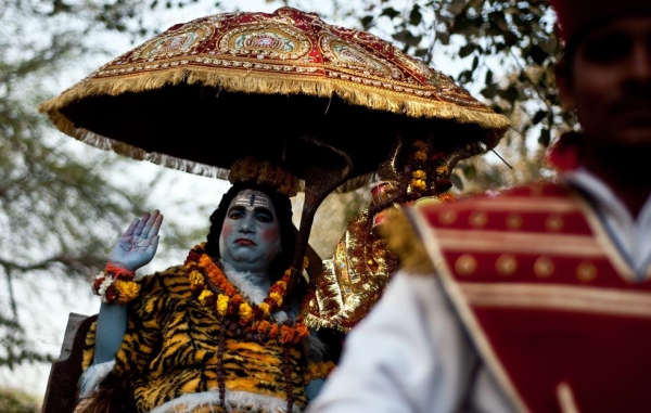 A devotee dressed as Hindu Lord Shiva takes part in a procession during Maha Shivaratri in New Delhi, India on February 20, 2012. (Manan Vatsyayana/AFP/Getty Images)