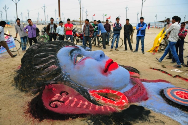 A sand sculpture of Hindu god Lord Shiva, made by Allahabad University students, is pictured on the eve of Maha Shivaratri festival in Allahabad, India on February 26, 2014. (Sanjay Kanojia/AFP/Getty Images)