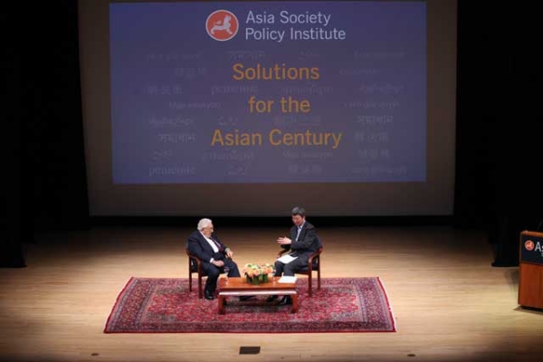 Henry Kissinger and Zhu Min on stage at the launch of the Asia Society Policy Institute in New York on April 8, 2014. (Ellen Wallop/Asia Society)