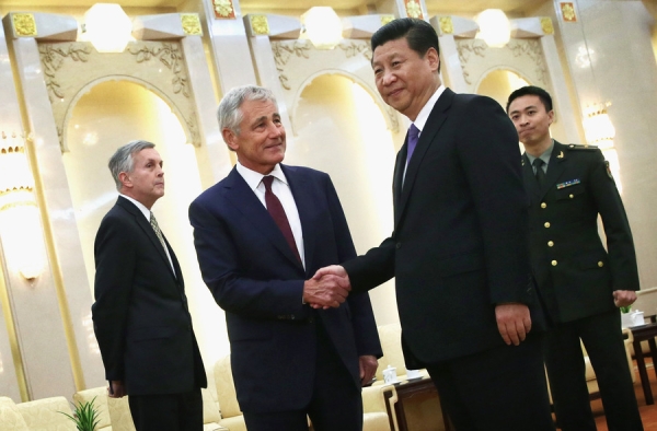 U.S. Secretary of Defense Chuck Hagel (2L) shakes hands with Chinese President Xi Jinping (3rd L) during a meeting at the Great Hall of the People April 9, 2014 in Beijing, China. (Alex Wong/Getty Images)