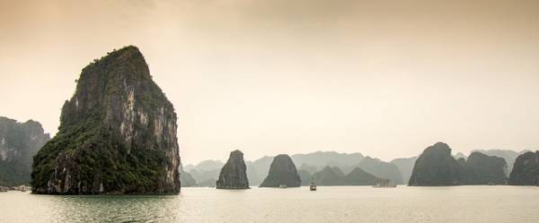 Limestone islets look like floating jewels in the jade-color sea in Ha Long Bay, Viet Nam on February 1, 2015. (J Durok/Flickr)