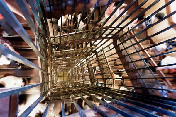 A spiraling stairwell crowded with people creates an optical illusion in Nagoya-shi, Japan on May 3, 2015. (Kirill Ξ/Κ Voloshin/Flickr)
