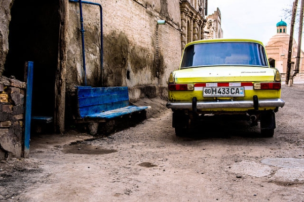 A beat up Russian Lada car parked on the streets of the 2,000 year old ancient city Bukhara, Uzbekistan on April 5, 2015. (Alex Steffler/Flickr) 
