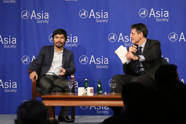 Asia Society Executive Vice President Tom Nagorski poses a question to Manny Pacquiao at Asia Society in New York on Monday, October 12, 2015. (Ellen Wallop/Asia Society)