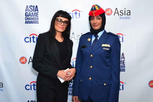 Fashion designer Norma Kamali poses with Asia Game Changer awardee Mariam al-Mansouri on October 13, 2015. (Jared Michael Siskin/Patrick McMullan)
