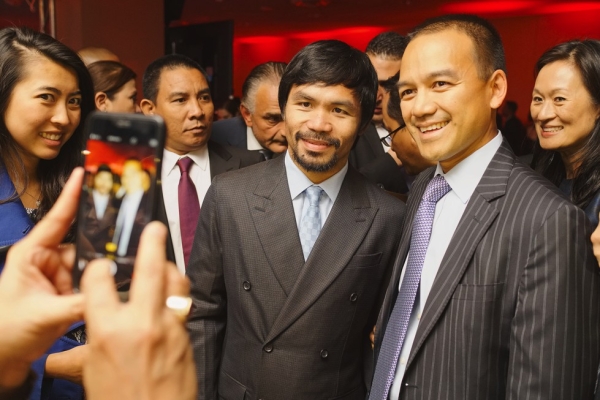 Manny Pacquiao poses with attendees of the 2015 Asia Game Changers award ceremony on October 13, 2015. (Jamie Watts/Asia Society)