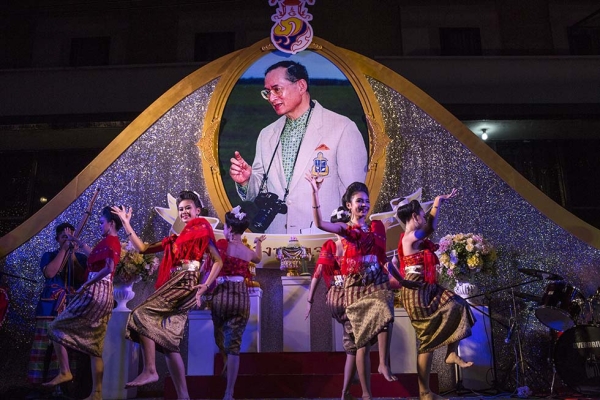 Thai dancers perform near the Grand Palace as the celebration for Thailand's King Bhumibol Adulyadej's 88th birthday begins on December 4, 2015 in Bangkok, Thailand. (Paula Bronstein/Getty Images)