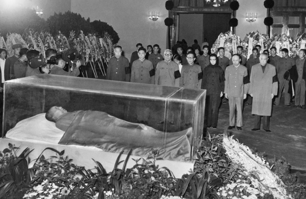 On September 9, 1976, Mao Zedong died at age 82 after ruling China for 27 years. His death effectively ended the Cultural Revolution. In this photo from September 13, 1976, party and state leaders pay their respects to Mao's remains. (Xinhua/AFP/Getty Images)
