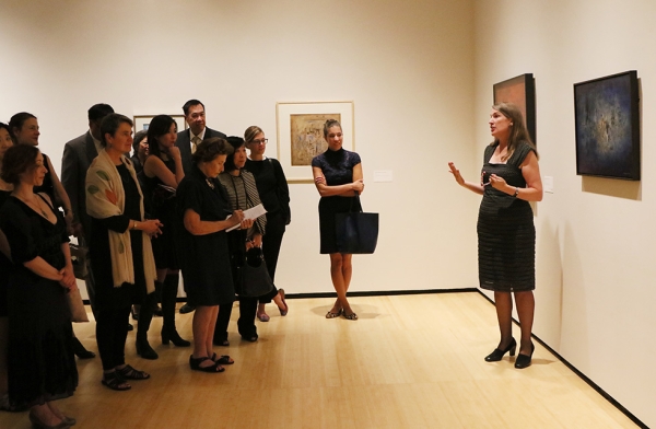 Dr. Ankeney Weitz the Ellerton M. and Edith K. Jetté Professor of Art, Colby College and co-curator of 'No Limits: Zao Wou-Ki' leads a group of members on a tour of the exhibition in New York on September 12, 2016. (Ellen Wallop/Asia Society)
