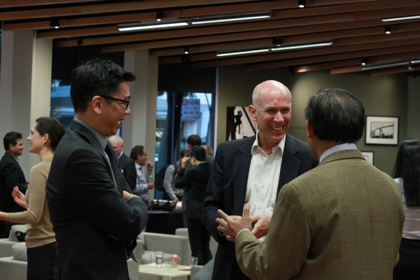 ASNC Associate Director Robert Hsu (left) chuckles with Larry Greenwood, President of Japan Society Northern California. (Asia Society)