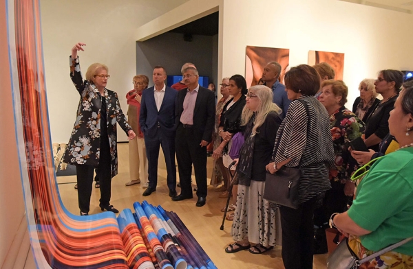 Members observe Dinh Q. Lê's Scroll #1 from his piece 'WTC from Four Perspectives,' featured in 'After Darkness: Southeast Asian Art in the Wake of History' at Asia Society New York on September 12, 2017. (Elsa Ruiz/Asia Society)