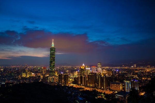 A city comes to life as buildings light up during nightfall in Taipei, Taiwan on June 12, 2015. (Brian Sheng/Flickr) 