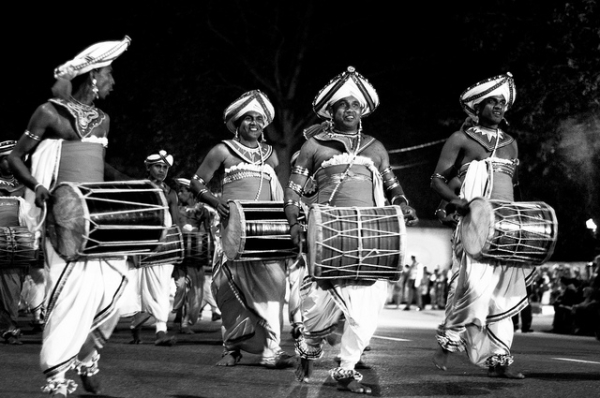 Four young drummers march in the Navam Perahera (The Parade of February) in Sri Lanka on February 6, 2012. (Alexis Gravel/Flickr)