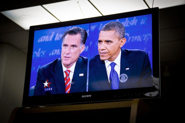 Governor Mitt Romney (L) and U.S. President Barack Obama (R) squaring off in the third 2012 U.S. Presidential debate, as seen at a debate viewing party in Covina, Virginia on Oct. 22, 2012. (Neon Tommy/Flickr)