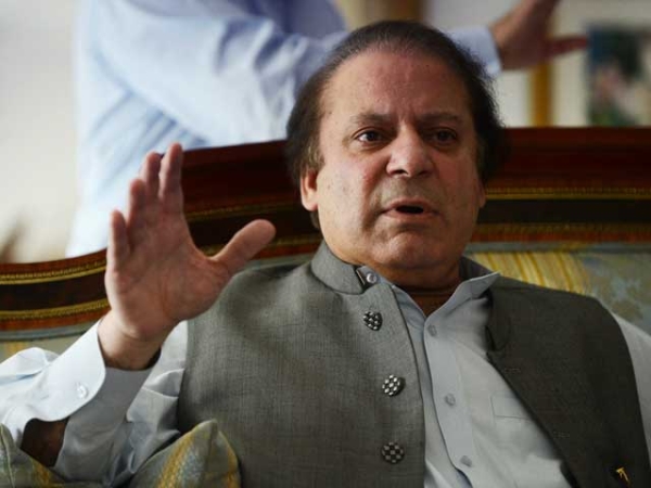 Pakistan's incoming prime minister Nawaz Sharif speaks to journalists at his farm house in Raiwind, on the outskirts of Lahore, on May 13, 2013. (Roberto Schmidt/AFP/Getty Images) 