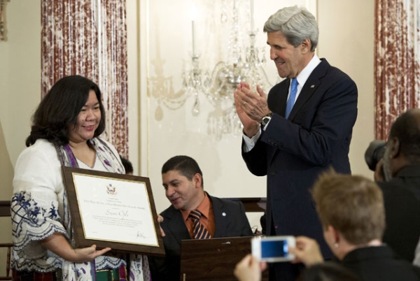 U.S. Secretary of State John Kerry (R) presents Susan Ople of the Phillipines with a Trafficking in Persons (TIP) Heroes' award during an event releasing the Annual Trafficking in Persons Report (TIP) Report at the State Department in Washington, DC, on June 19, 2013. (Saul Loeb/AFP/Getty Images) 
