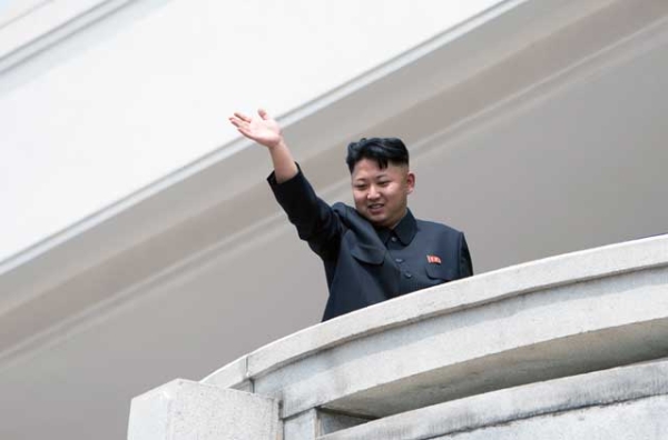 North Korean leader Kim Jong Un, shown here reviewing a military parade in Pyongyang on July 27, could be waving goodbye to hopes from the international community that he would "behave better" in 2013.  (Ed Jones/AFP/Getty Images) 