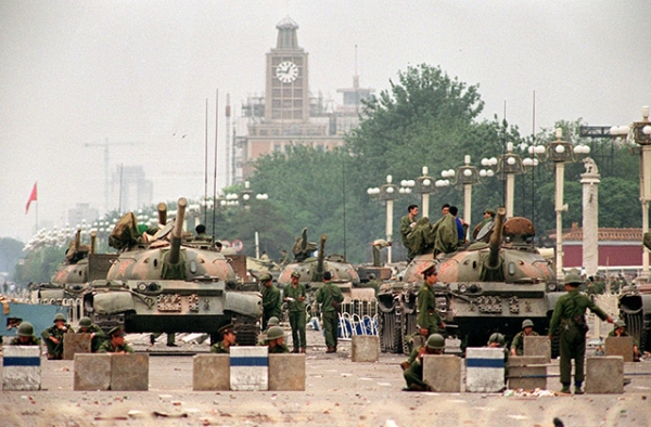 People’s Liberation Army tanks stand guard on Chang’an Avenue in Beijing on June 6, 1989, two days after soldiers opened fire on civilians. (Manuel Ceneta/AFP/Getty)