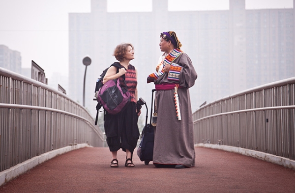 Reporter Jocelyn Ford and Zanta, the subject of her film, stand on a Beijing overpass. (Jocelyn Ford)