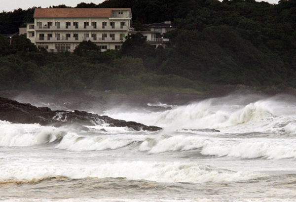 High waves crash into the coast at Hyuga in Miyazaki prefecture, Japan's southern island of Kyushu on July 16, 2015. (Jiji Press/AFP/Getty Images)