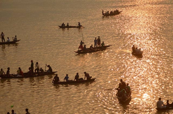 Oarsmen row boats during the traditional annual boat race festival at a Rudra Sagar lake in Melaghar, India on September 6, 2015. (Arindam Dey/AFP/Getty Images)