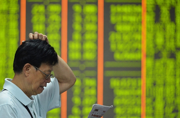 Veteran China-watchers explain what things they look for when monitoring China's economy. (STR/AFP/Getty Images)