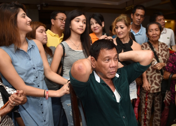 Philippine President-elect Rodrigo Duterte speaks during his first press conference since he claimed victory in the presidential election, at a restaurant in Davao City, on the southern island of Mindanao on May 15, 2016. (TED ALJIBE/AFP/Getty Images)