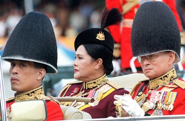 Crown Prince Vajiralongkorn (L) is poised to replace his late father, King Bhumibol Adulyajev (R), atop Thailand's monarchy. Can he be a unifying force? (Pornchai Kittiwongsakul/AFP/Getty Images)